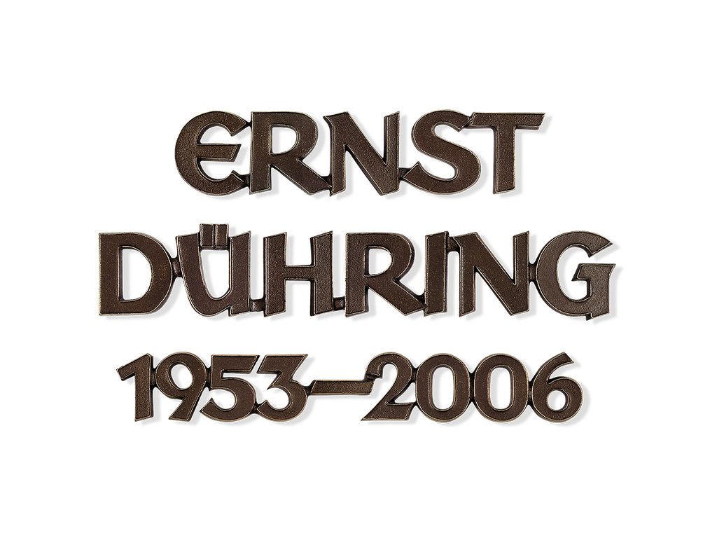 Bronzový nápis Dühring na náhrobok